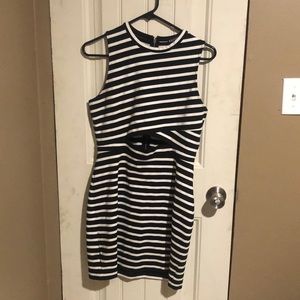 Tight striped dress with a small cutout